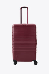 The Medium Check-In Roller in Burgundy