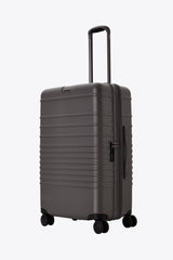 The Medium Check-In Roller in Charcoal