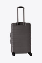 The Medium Check-In Roller in Charcoal